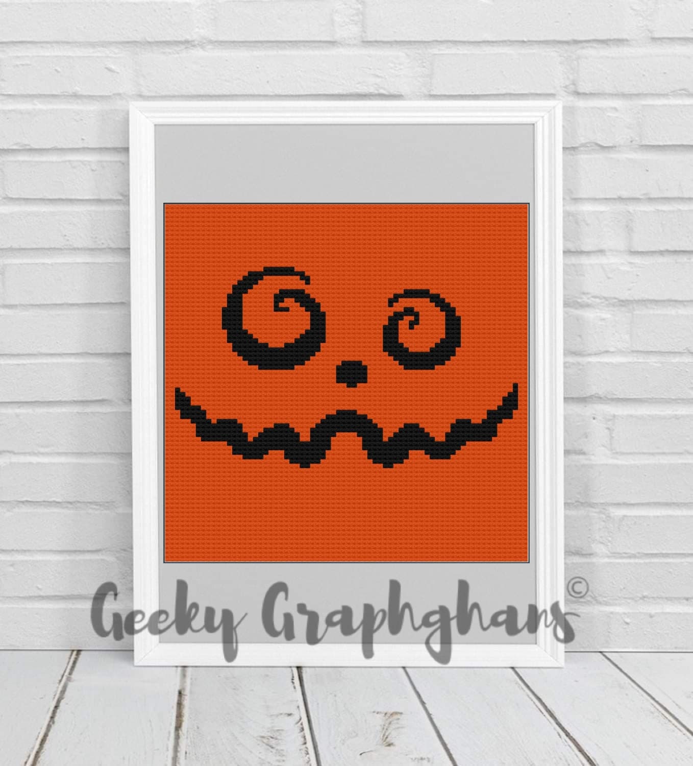 https://www.geekygraphghans.com/cdn/shop/products/PumpkinFaceCrochetPillowPattern_2_1445x.jpg?v=1666282267